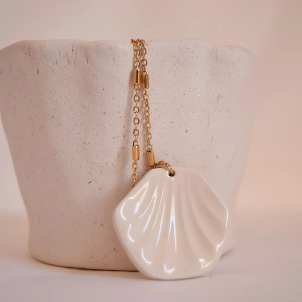 Collier coquillage face