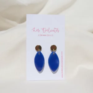 Boucles d'oreilles en forme de plumes bleues klein